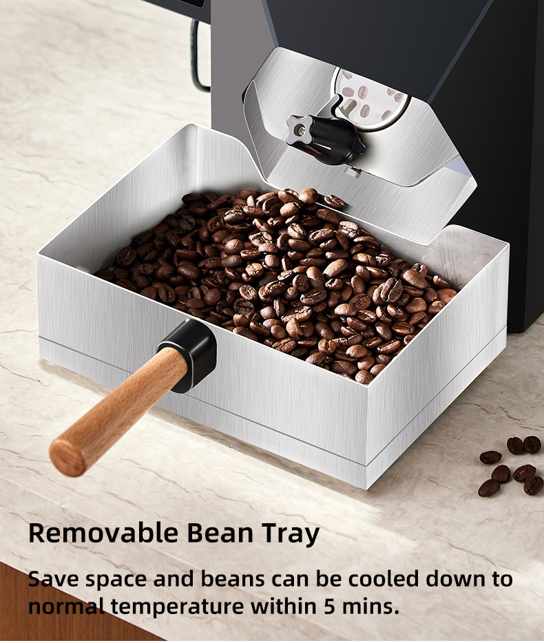 Close-up of a removable bean tray filled with roasted coffee beans attached to a coffee roaster, with text highlighting that beans can cool to normal temperature within 5 minutes.
