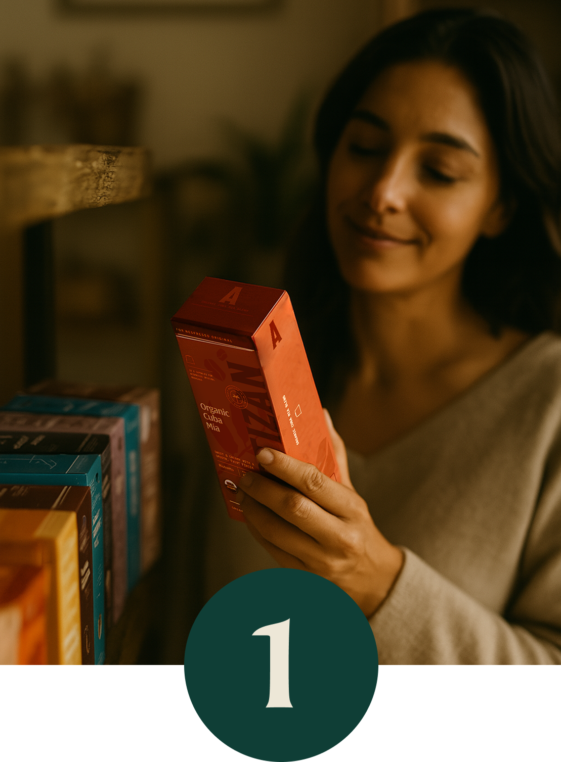 Smiling woman selecting an Artizan Organic Cuba Mia coffee box from a shelf