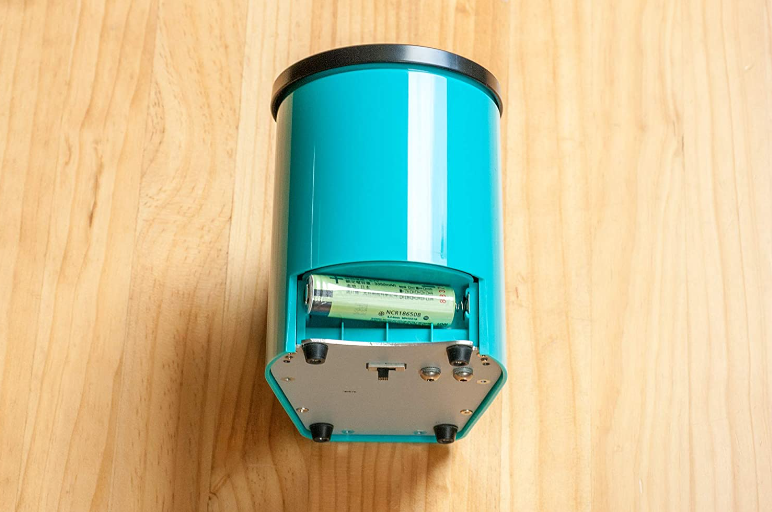Side angle of RoastRite RM-800 Coffee Moisture and Density Meter highlighting ergonomic design.
