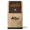 Brown coffee bag labeled 'Organic Syroom Coffee Fusion' with checkboxes for roast levels.