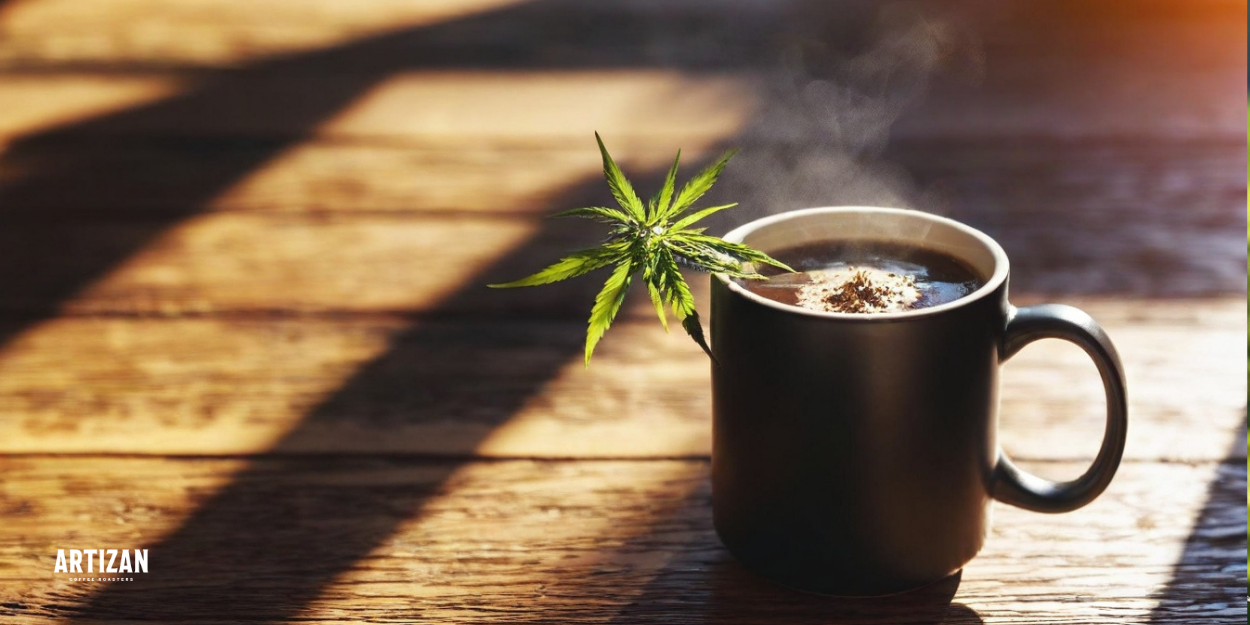 A cup of coffee with a hemp leaf on top