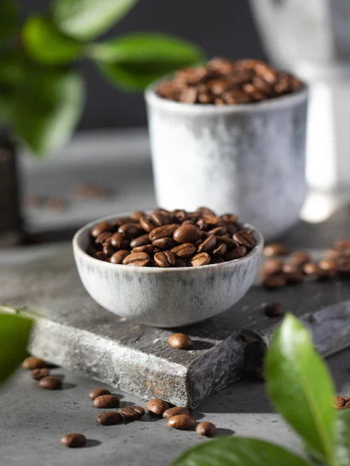 a handful of roasted coffee beans 
