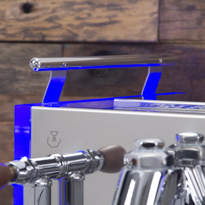 Top view of Bezzera Matrix MN espresso machine featuring modern design with illuminated blue LED light accents.