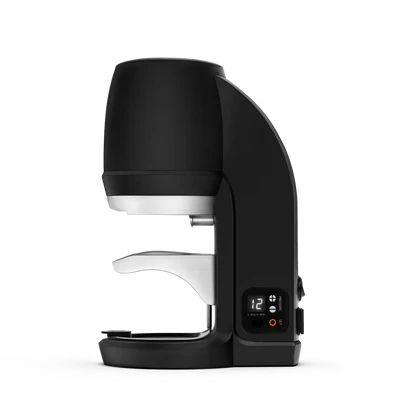Side profile of Puqpress Q 58.3mm black automatic tamper showing slim build