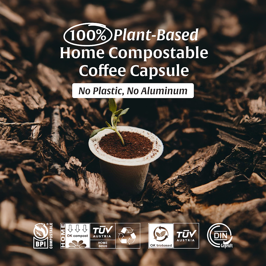 Image of Artizan Coffee Roasters' 100% plant-based, home compostable Nespresso Original capsule with text "No plastic, no aluminum" and logos of BPI Compostable, TUV Australia HOME OK Compost, TUV Austria OK Biobased, and DIN Geprüft.