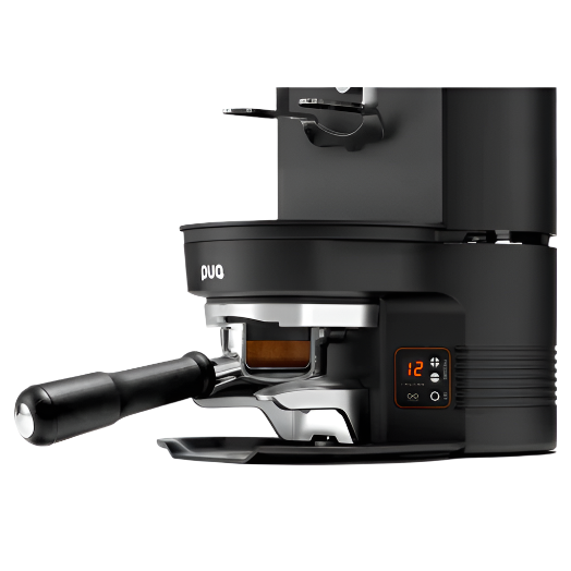 Puqpress M3 Gen 5 Automatic Coffee Tamper black mounted under grinder, angled side view
