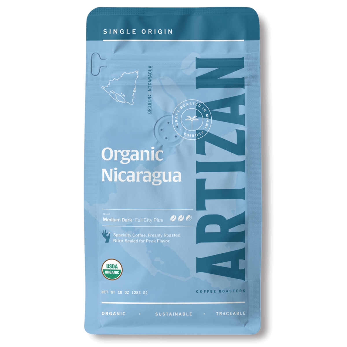 Package of Artizan Coffee Roasters' Organic Nicaragua espresso blend with a description of flavor notes.
