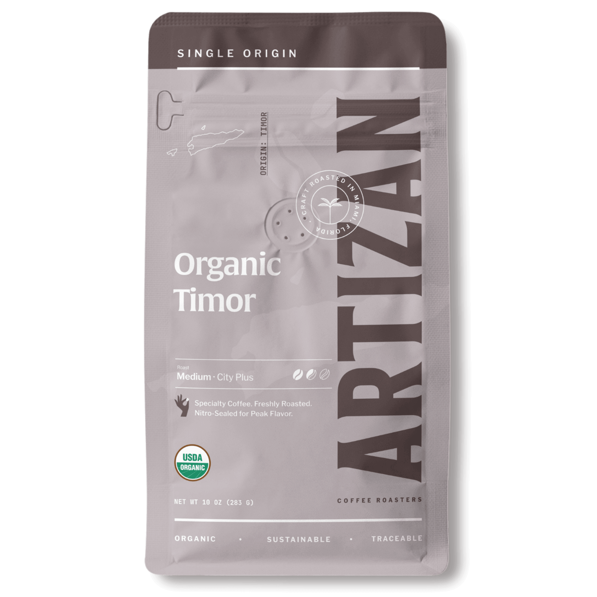 Package of Artizan Coffee Roasters' Organic Timor espresso blend with a description of flavor notes.