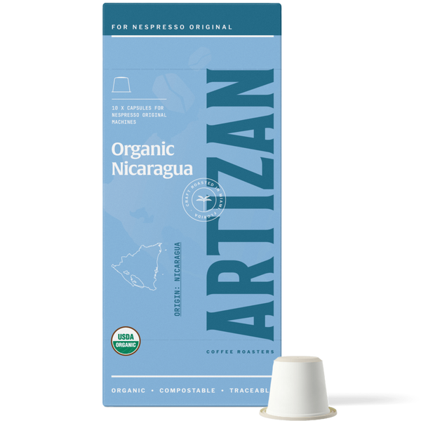 Front Image of Organic Nicaragua Single Origin Coffee Home Compostable Pods for Nespresso Original Machine with Pod Beside It. 